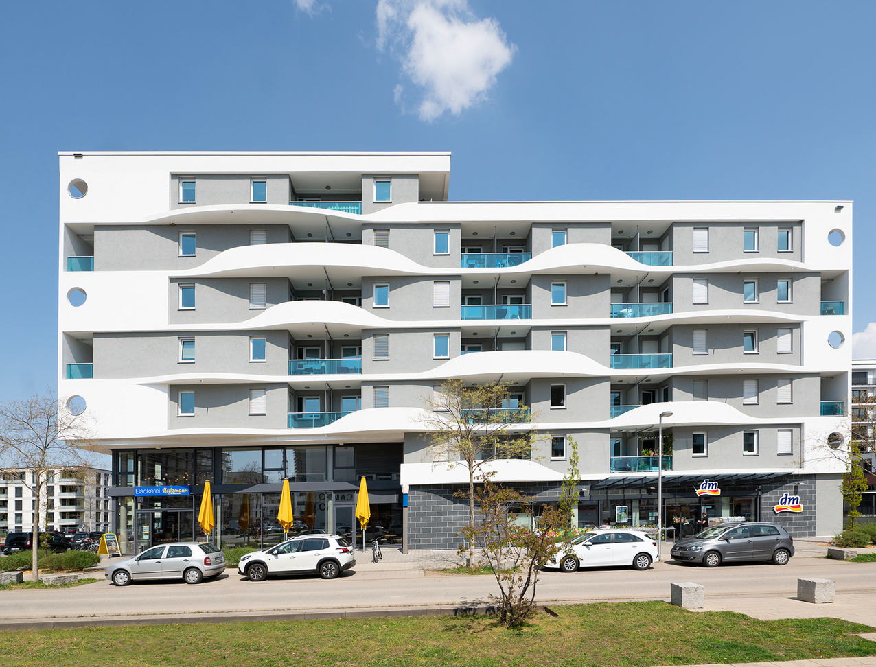 Apartment building with a bakery and a drugstore on the ground floor