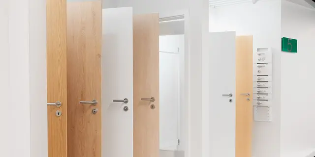 Part of the weisenburger sampling parcours: doors selection of doors at the sampling center baustein