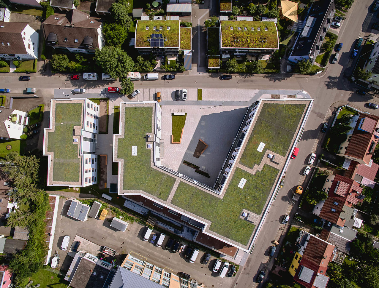 Drone image of an apartment building in Freiburg that was built by weisenburger